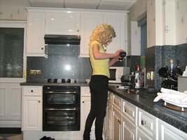 Debbie the slut pouring her self a vodka and cock her other favorite drink ...
