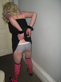 Debbie the slut pulling up her black dress as commanded by her mistress Ire...