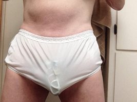 White briefs with lace trim, and my cage is showing.