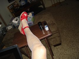 showing off my shoes and leg in white fishnet nylons