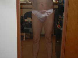 Can you see the outline of my hard cock in these pretty pink panties?