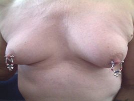 bukinut73's Slave bitch with tits and always locked up shrinking clit.