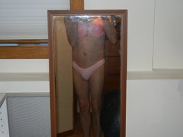 Wearing a Victoria's Secret swim bottom. Love the soft pink color.