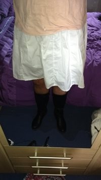 Do you like my white skirt and boots?