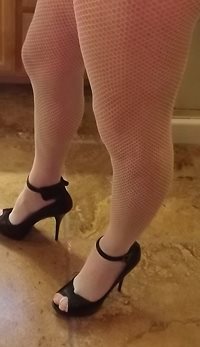 white fishnets, make me feel so horny. need another girl to play with to sh...