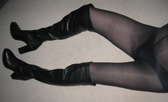 Over the knee boots and black opaque tights