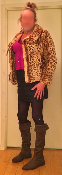 New clothes. Rabbit fur jacket and leather boots.  