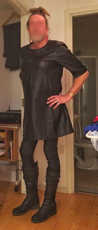 Leather dress, leather boots.