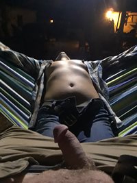 My girlfriend on backyard hammock just before we had sex.