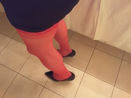 Legs in red stockings