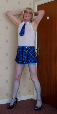 This schoolgirl needs to be spanked for wearing this outfit to school.