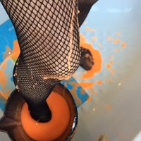 my fishnet stocking legs in orange goo...  