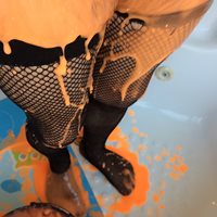 my fishnet stocking legs in orange goo...  