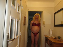 Debbie the slut posing in her new bra and panties that arrived today in the...
