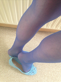 In sexy blue stockings and flats hope you like my nylon legs and feet