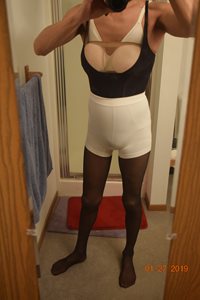 New body shaper.  Pantyhose, lycra, spandex and satin layers.