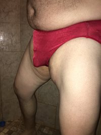 Caged in red panties