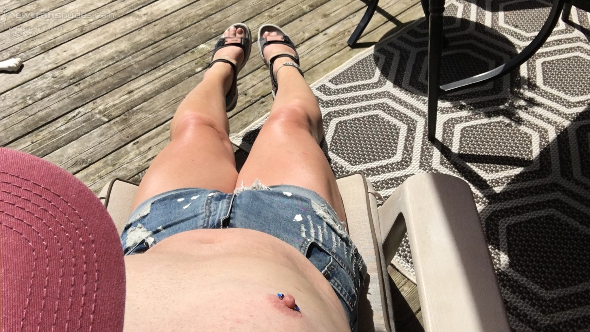 in my daisy dukes... painted toes, anklet, sandals, shaved legs..