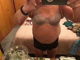 In 42b bra and lacy panties