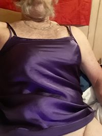 Purple camisole nighty,  black bra under