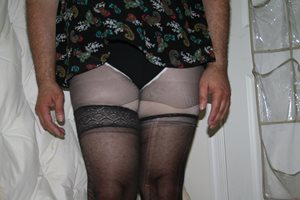 This skirt is much too short my black and white lacy panties are showing. W...