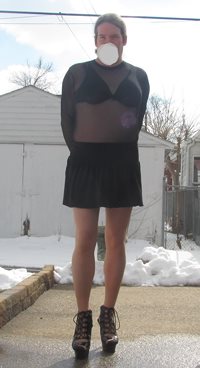 sissy in her chastity outdoors