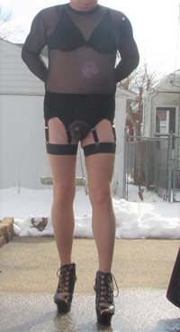sissy in her chastity outdoors