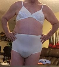 Getting dressed for work this morning in a Warners bra and Bali panty.