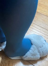 Blue nylons in fluffy slippers