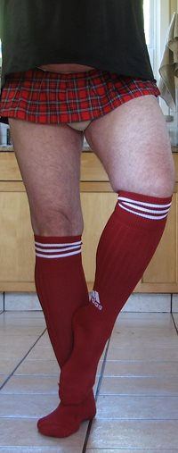 Red tartan skirt and red knee socks