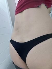 Wearing my black cotton thong at work. Do you think I'm naughty?