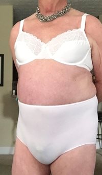Crossdressing 101, part 2, wearing a, bra and panty only.