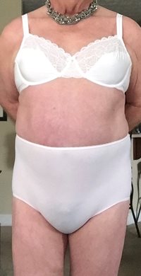 Crossdressing 101, part 1,  wearing a, bra and panty only.