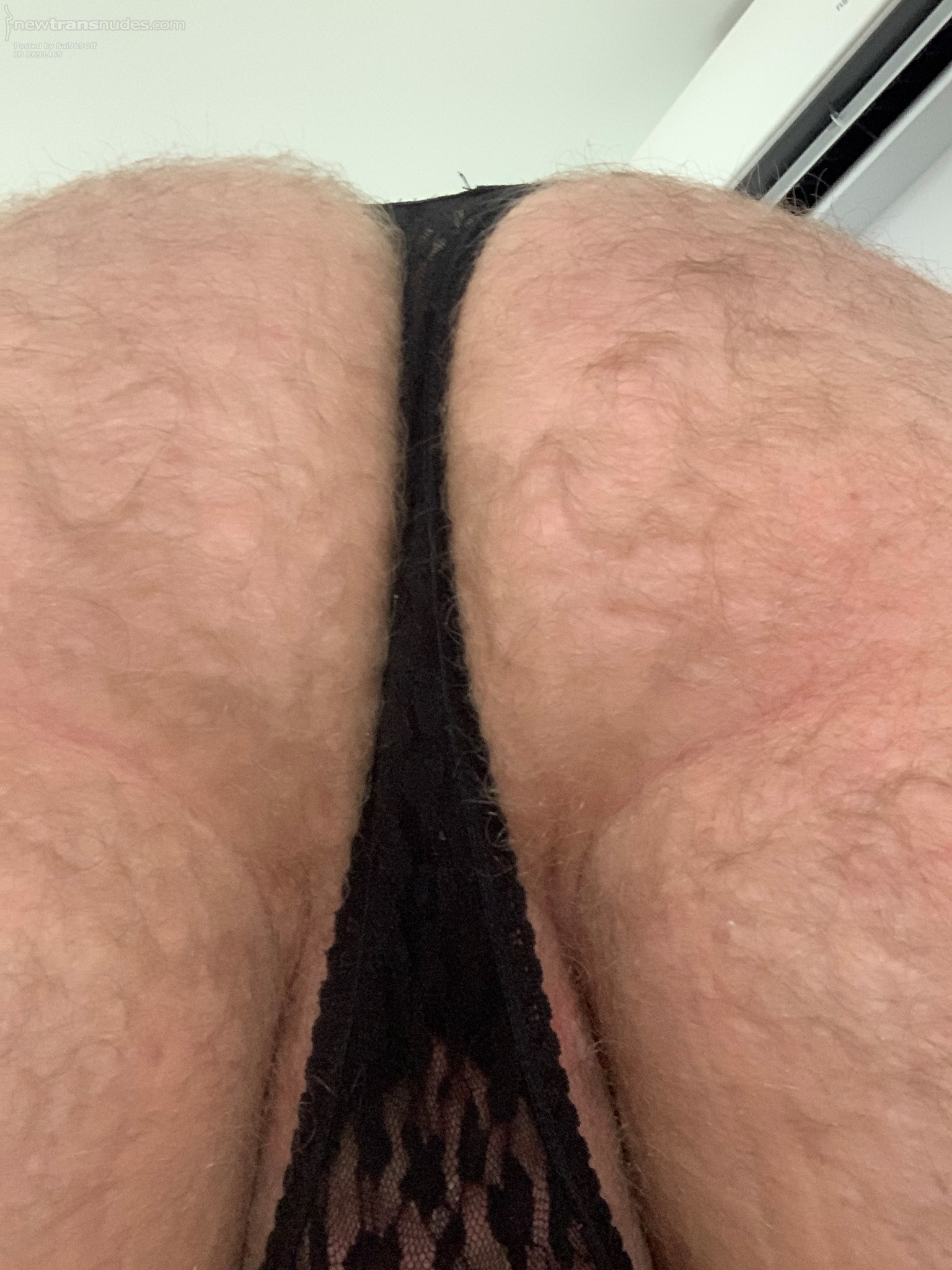 My ass in black lace g-string.  😍