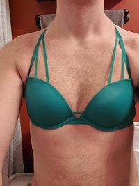 Green bra cleavage