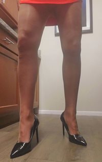 New red dress and brown pantyhose. It's a preview of things to cum for a ne...