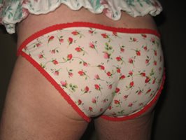 My floral string bikini, tight against my ass