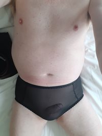 Sheer black see through nylon with discrete little access slot to my pussy....