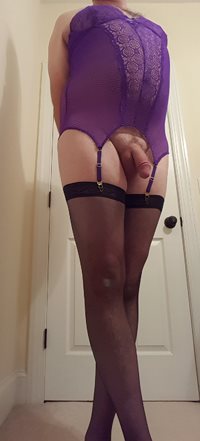 Purple fishnet and thigh highs
