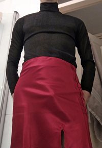 Going commando in red satin skirt