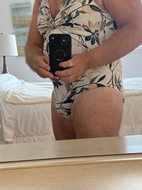 I tried on one of my wife's one piece bathing suits.. What do you think.?