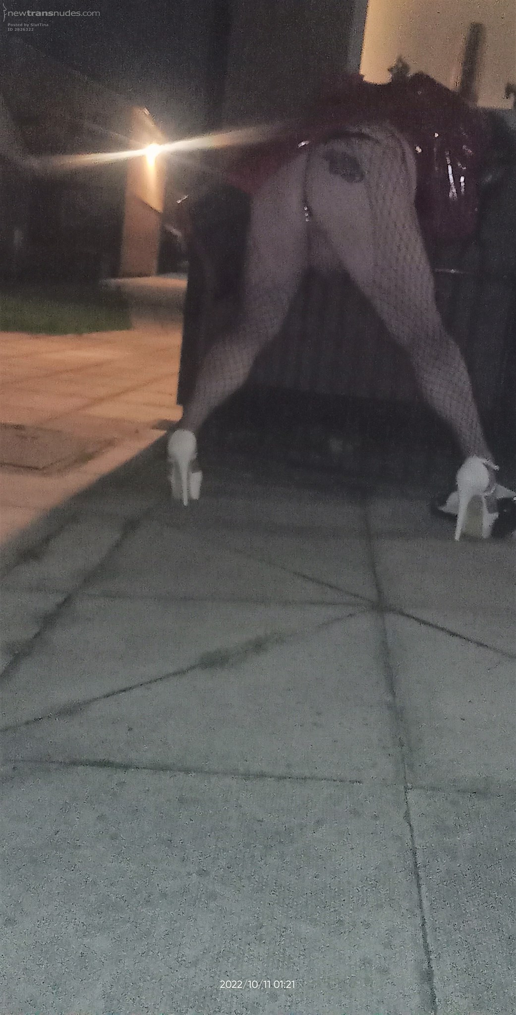 Red PVC acting the hooker,Showing what is on offer