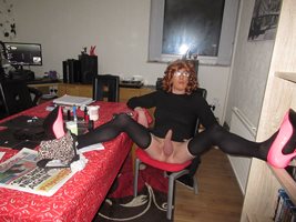 Debbie the slut posing in her new black dress
