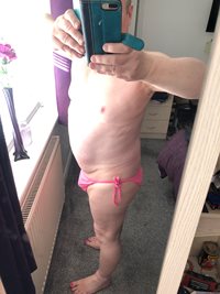 trying on Bikini's for my beach trip.  Do you like the Pink, the Orange or ...