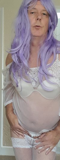 Sissy, dressed, wig but no make up. What you see is what you get.