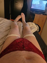 My red panties and white thigh length stocking, first time.