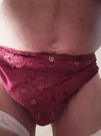 My red panties and white thigh length stocking, first time.