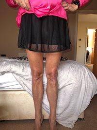 Cute little mesh tennis skirt and pink satin blouse. I had laser hair remov...