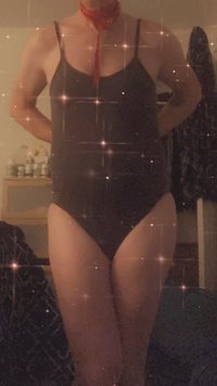 Posing in one piece bathing suit