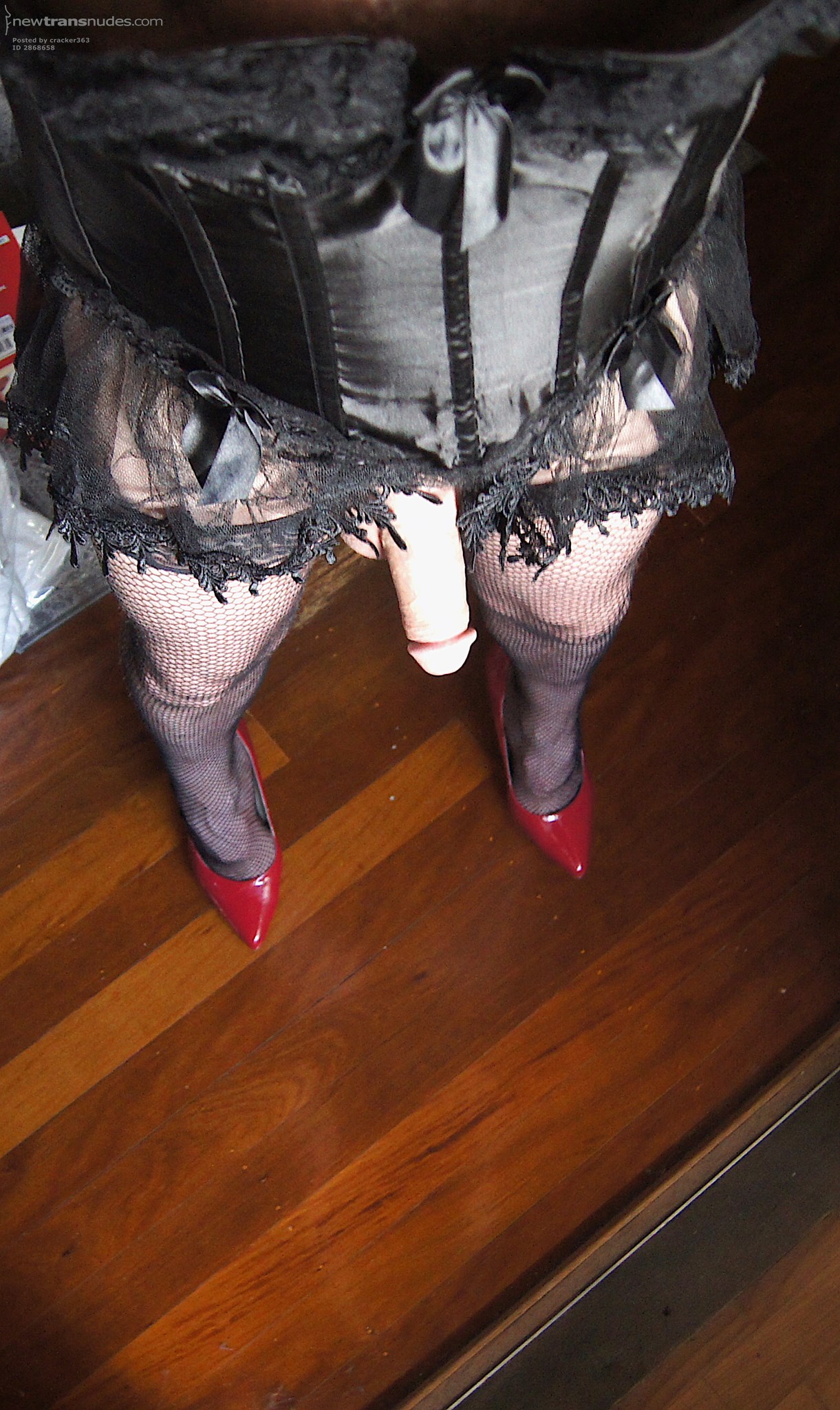 Love a sexy combination of corset , stockings and sexy red heels - do you?